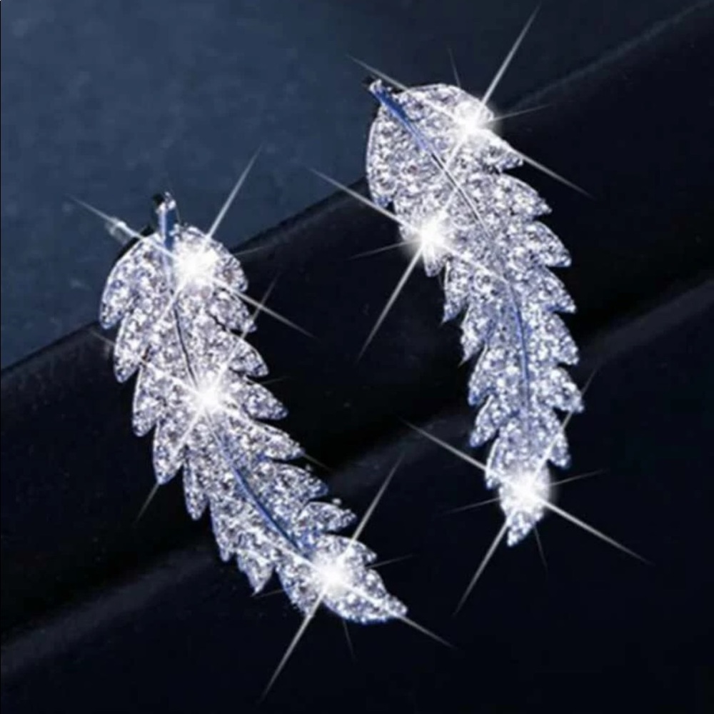New Silver feather stud earrings